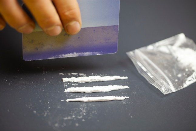 Man Doing Lines With Credit Card